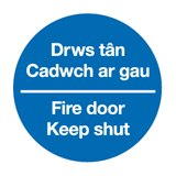 Drws tan Cadwch ar gau Fire door Keep shut  Welsh/English sign MJN Safety Signs Ltd
