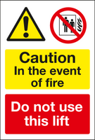 Caution in the event of fire do not use this lift sign MJN Safety Signs Ltd